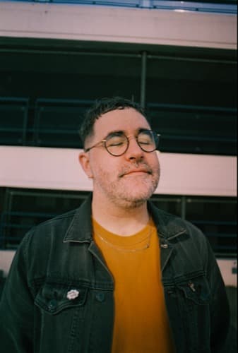 Nathan Shubert portrait with eyes closed